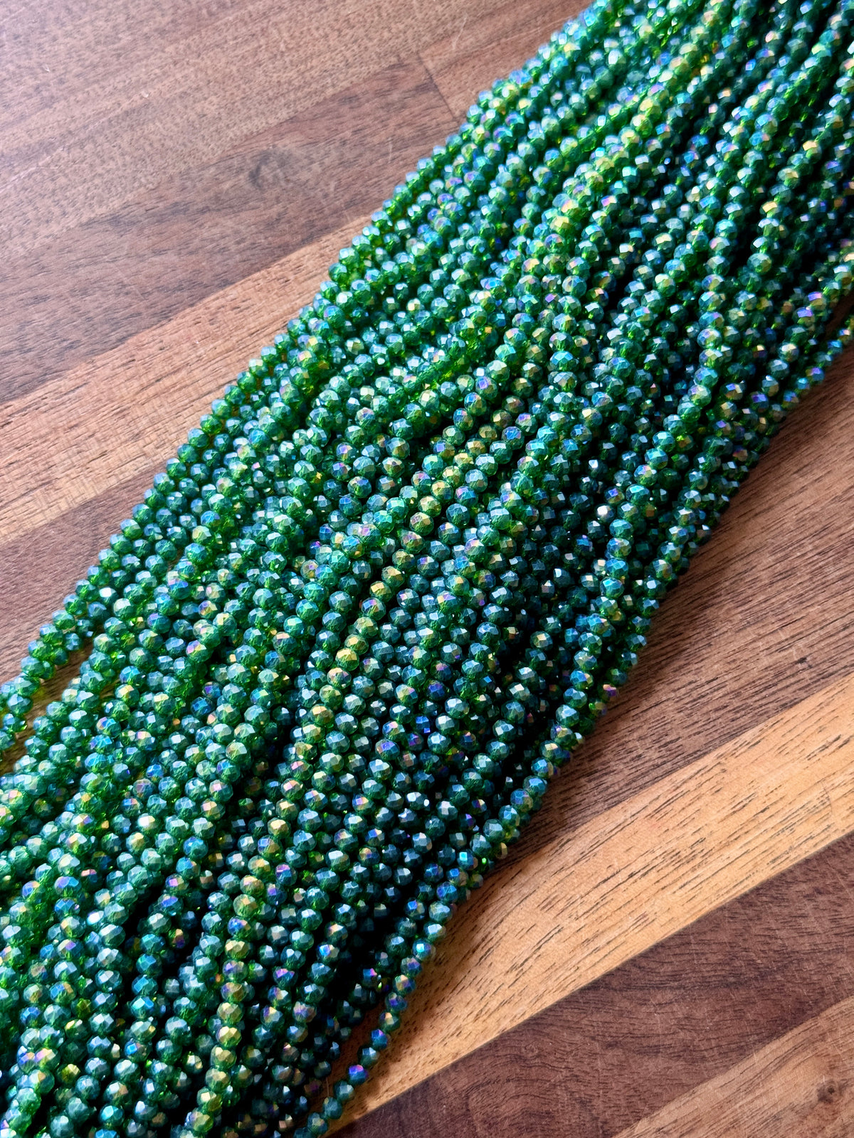 Clear Emerald AB E/72: Single Strand or 10 Strand Pack