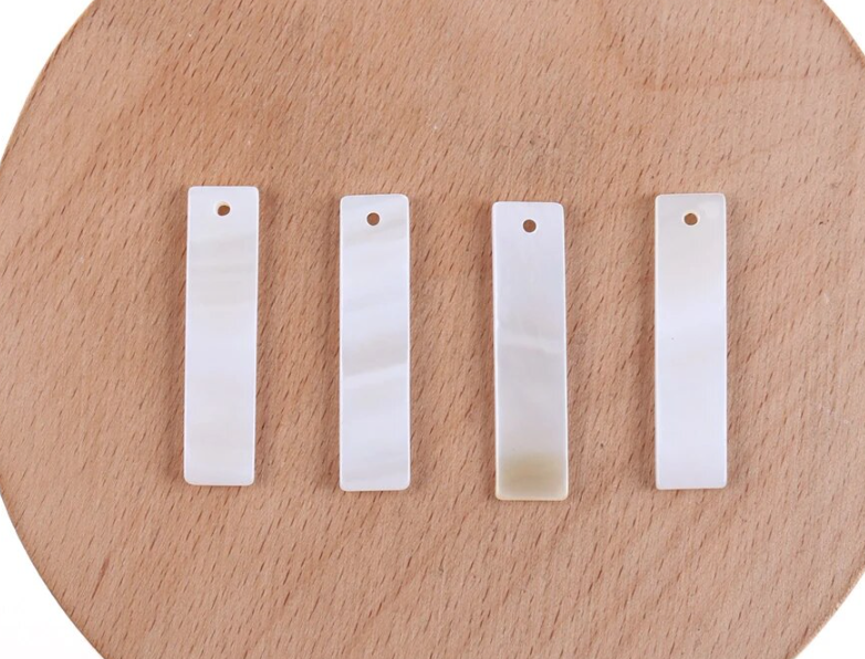 *PREORDER* Long Rectangle Shell Centerpieces 30x7mm: 50 Pairs
